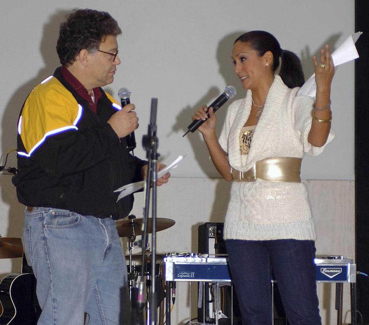 In this image provided by the U.S. Army, then-comedian Al Franken and sports commentator Leeann Tweeden perform a comic skit at Forward Operating Base Marez in Mosul, Iraq, on Dec. 16, 2006, during the USO Sergeant Major of the Army's 2006 Hope and Freedom Tour.