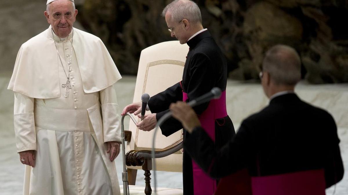 
Pope Francis arrives for his weekly general audience in the Pope Paul VI hall at the Vatican on Wednesday.
