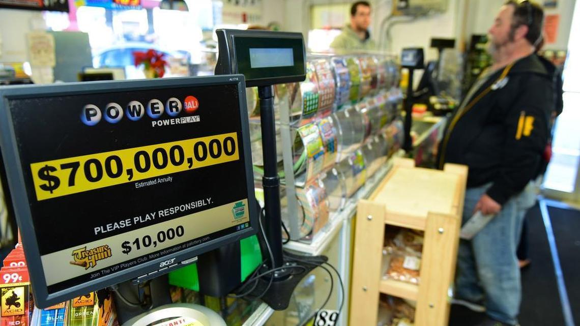 Jerry Clark buys Powerball lotter tickets, Thursday, Jan. 7, 2016 at Bill's Kwik Chek in Chambersburg, Pa. The estimated prize for this weekend’s Powerball, which has grown from $700 million to $800 million since Thursday, is the largest jackpot of any lottery game in U.S. history.