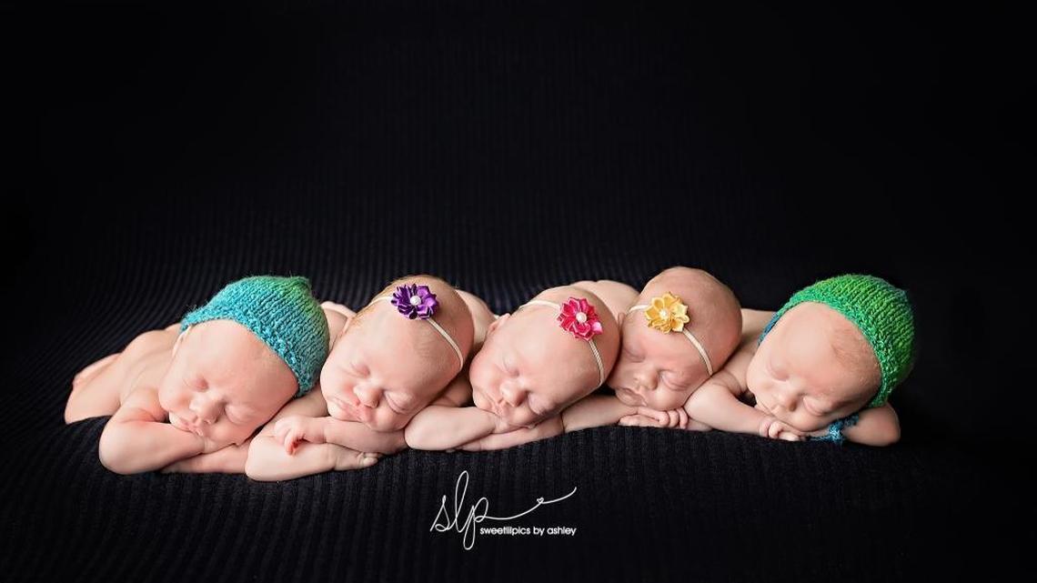 Gavin, Dakota, Zoey, Hollyn and Asher Driskell slept through their photo shoot. Photographer Ashley Childress said getting that many babies to sleep at once was the result of a toasty warm studio, a noise machine and “a whole lot of luck.”