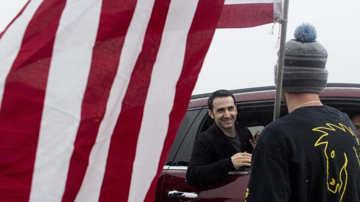 Amir Hekmati, a U.S. Marine, thanks the community after his return flight home on Thursday, Jan. 21, 2016, at Bishop International Airport in Flint, Mich. He returns after being imprisoned in Iran for more than four years.