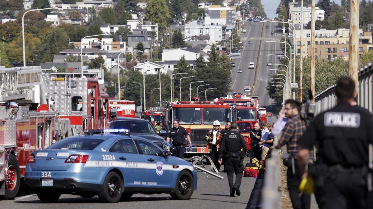 
Emergency vehicles surround the site of a deadly crash between a charter bus and an amphibious tour vehicle in Seattle on Sept. 24, 2015.
