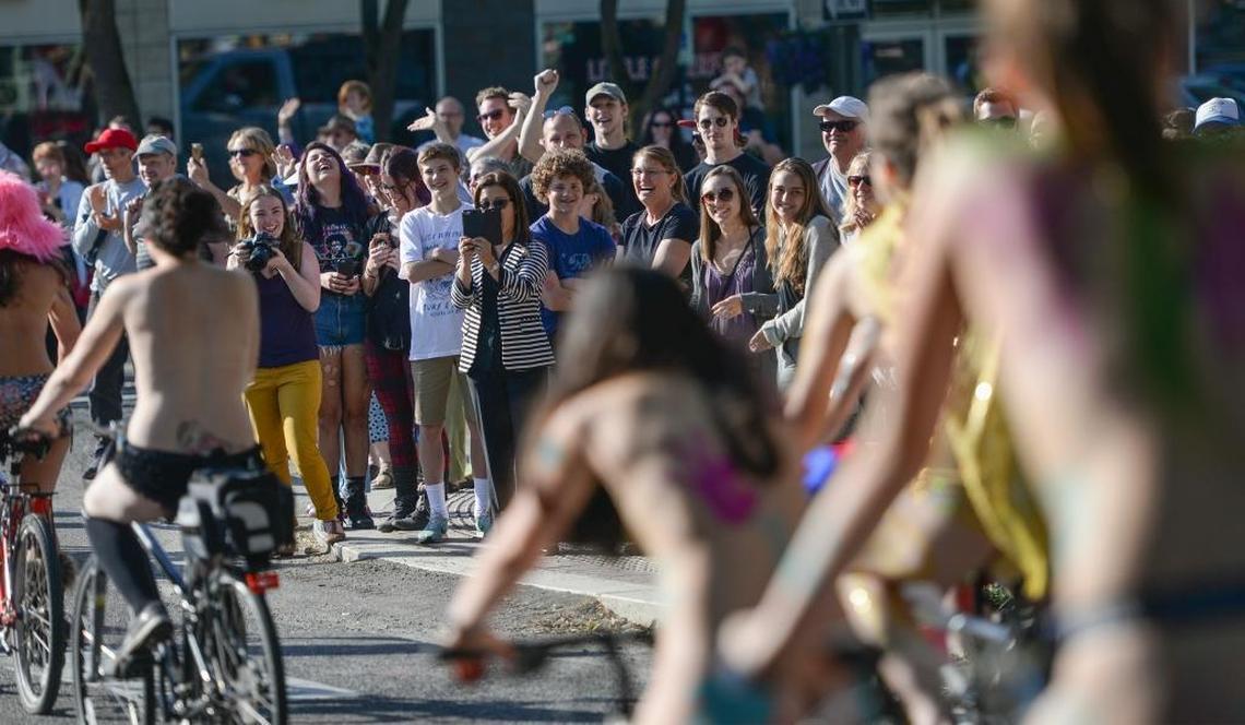Scantily clad and nude cyclists parade through the streets of Bellingham, Friday, June 2, 2017, for the ninth annual Bellingham World Naked Bike Ride.