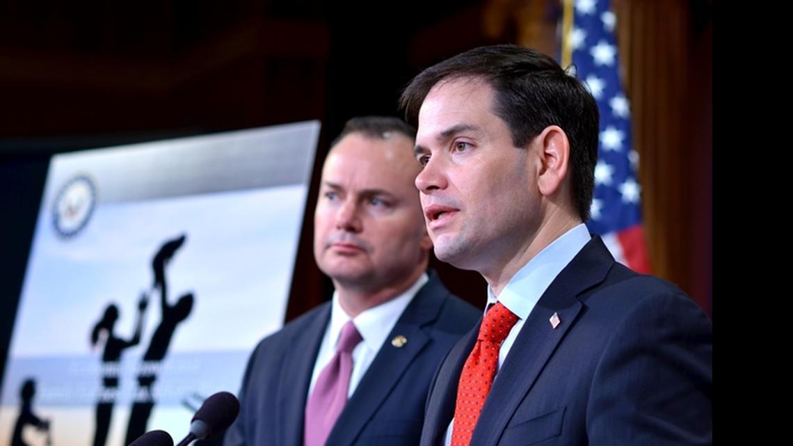 
U.S. Sen. Marco Rubio of Florida (right) discusses an overhaul of the nation’s corporate and individual tax systems during a Washington press conference March 4, 2015. On the left is Sen. Mike Lee of Utah.
