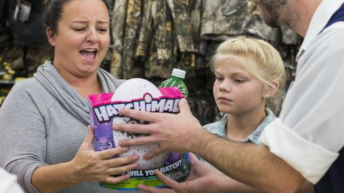 Kelly Ingram snared a Hatchimal, a top toy of the season, at Walmart’s Black Friday event in Bentonville, AR on Nov. 24, 2016.