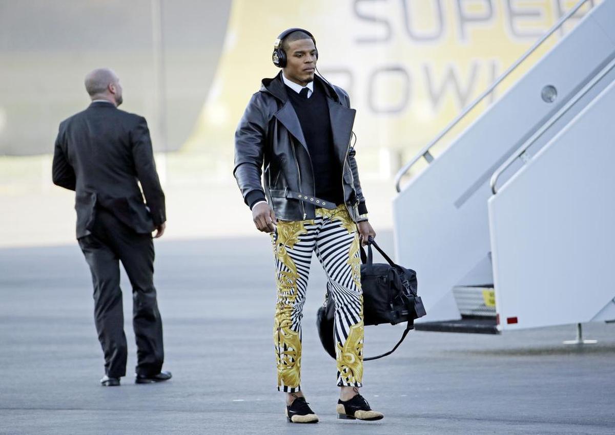 As of this past weekend, this may be Newton’s most famous outfit. Or to be more accurate, his most famous pants. The skin-tight zebra-striped Versace pants with a gold Barocco print, worn for the trip to Super Bowl 50, caught the eye of pretty much everyone on earth. He paired the pants, which reportedly retail for $850 but are sold out everywhere (sorry, guys), with black and gold oxfords and a black leather jacket. You be you, Cam.