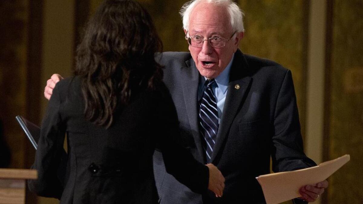 Democratic presidential candidate Sen. Bernie Sanders, I-Vt., greets student Shweta Wahal with the School of Foreign Service at Georgetown University in Washington, Thursday.