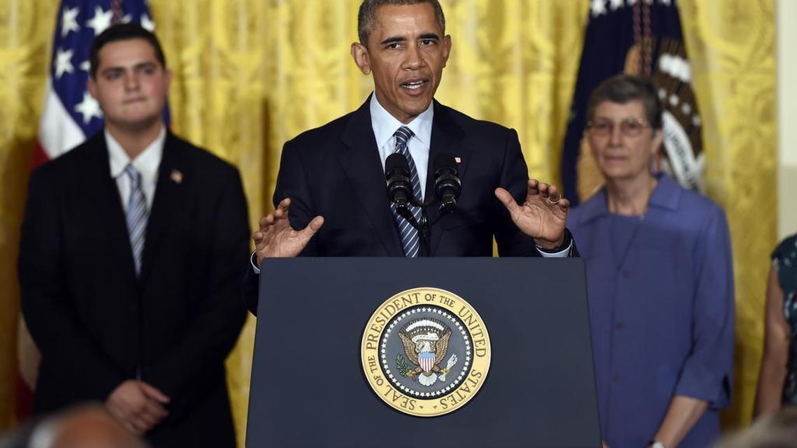 
President Barack Obama speaks about his Clean Power Plan, Monday, Aug. 3, 2015, in the East Room at the White House in Washington. The president is mandating even steeper greenhouse gas cuts from U.S. power plants than previously expected, while granting states more time and broader options to comply. 
