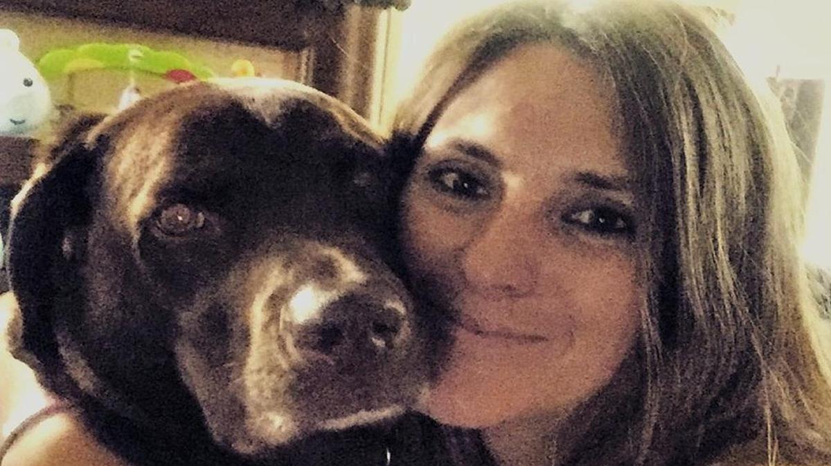 Lisa McCombs, honorably discharged from the Army in 2009 as a captain, acquired her service dog, Jake, after being diagnosed with PTSD from her time serving in Iraq and Afghanistan.