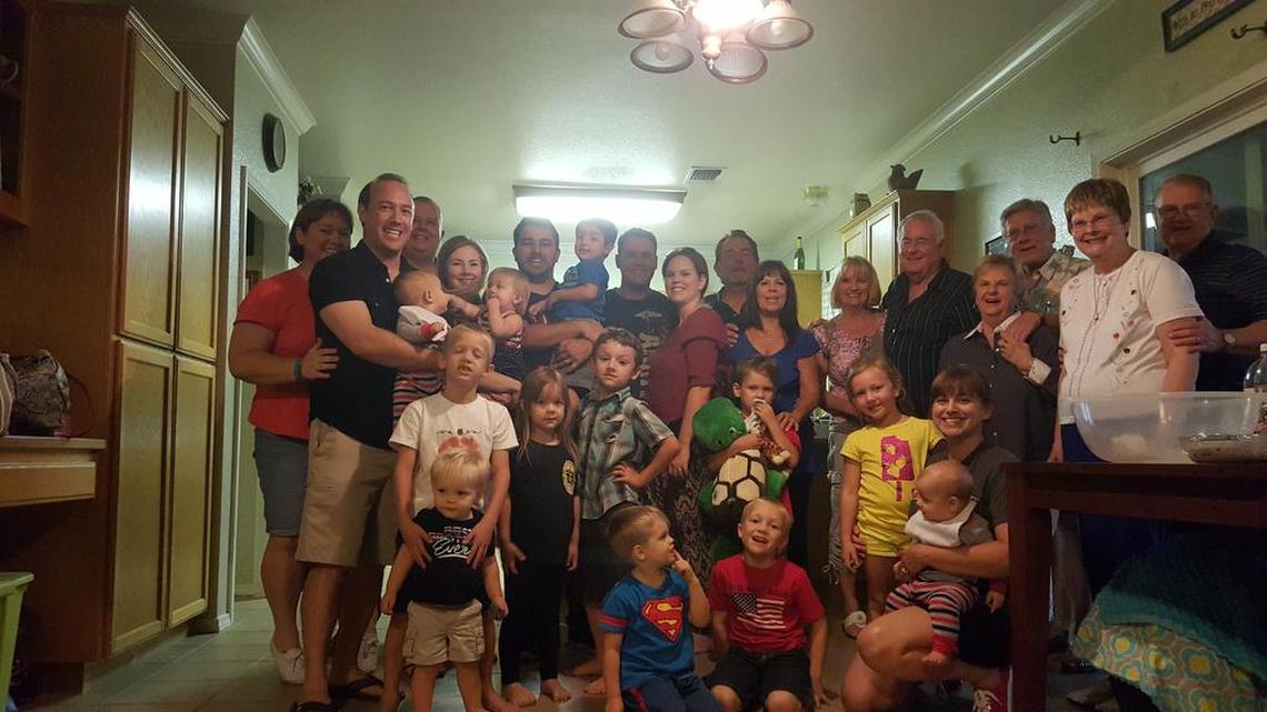 Some of the Northside Christian Church members who have helped Daniel and Jaimie Yoder with many projects around their Fresno home and who recently bought Daniel Yoder a plane ticket to come home before he is deployed to Kuwait.