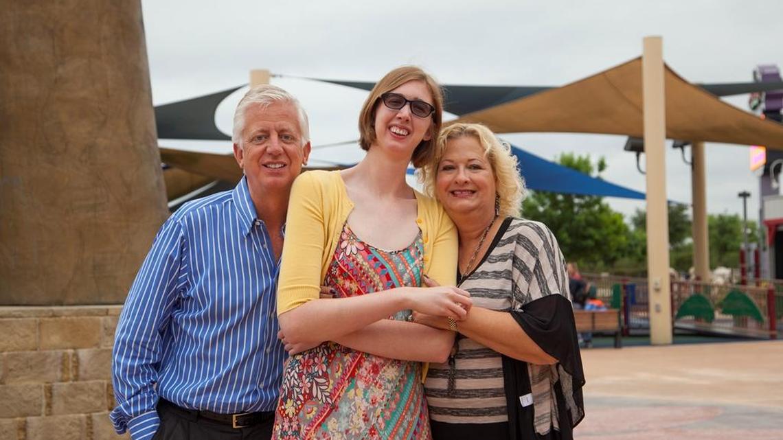 The Hartman family poses together for a picture.
