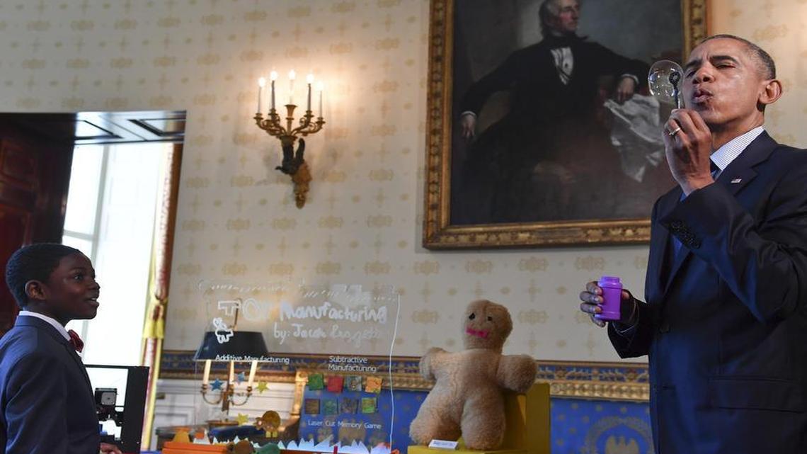 Jacob Leggette, 9, of Baltimore looks on as President Barack Obama blows a bubble while visiting his science exhibit during the annual White House Science Fair in April 2016. Obama started the fair as a way to highlight and encourage STEM education.
