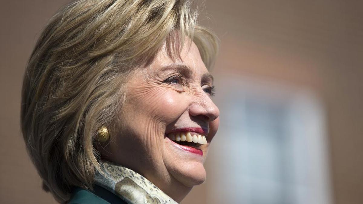 Democratic presidential candidate Hillary Rodham Clinton smiles during a campaign rally, Friday, Oct. 23, 2015, in Alexandria, Va.
