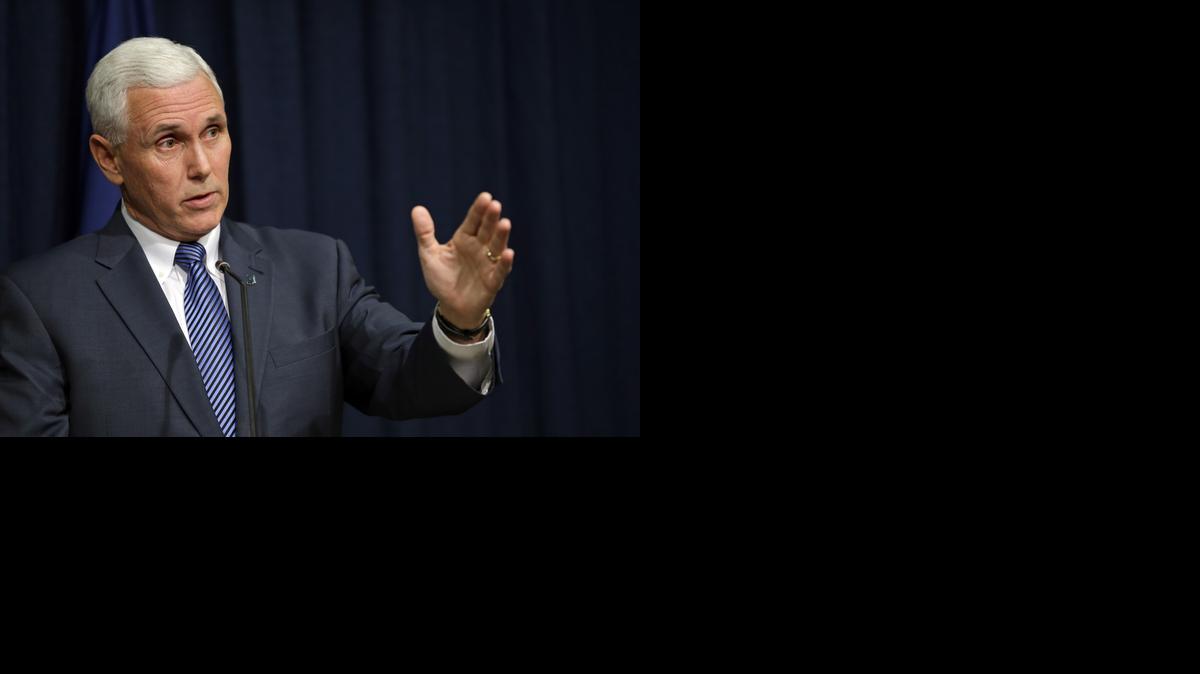 
Indiana Gov. Mike Pence holds a news conference at the Statehouse in Indianapolis, Thursday, March 26, 2015. 
