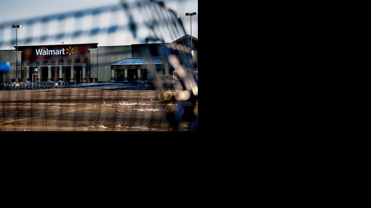 
This photo shows Wal-Mart with a shopping cart in the foreground in Hayden, Idaho, Tuesday, Dec. 30, 2014.
