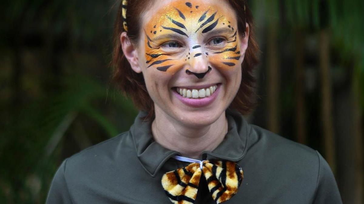 Stacey Konwiser smiles during the 2015 dedication of the new tiger habitat at the Palm Beach Zoo in West Palm Beach, Fla. Konwiser, 38, was attacked and killed Friday by a 13-year-old male tiger in an enclosure known as the night house, where tigers sleep and are fed. The Palm Beach Zoo is reopening Monday as authorities from several local, state and federal agencies continue investigating what led to Friday’s deadly attack.