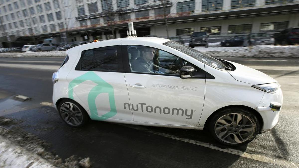 Researchers at Massachusetts Institute of Technology are asking drivers how they'd handle life-or-death decisions made by their driverless cars in hopes of creating better algorithms to guide autonomous vehicles such as this one being driven by an engineer in Boston.