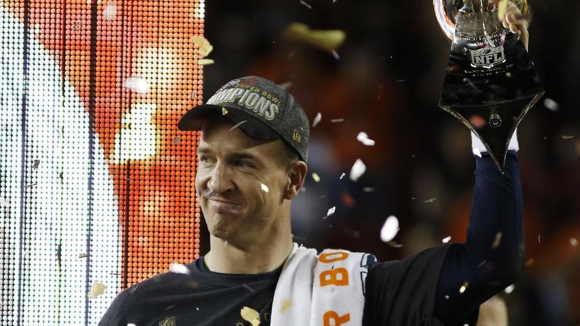 Denver Broncos’ Peyton Manning holds up the trophy after the NFL Super Bowl 50 football game against the Carolina Panthers, Sunday, Feb. 7, 2016, in Santa Clara, Calif. The Broncos won 24-10.