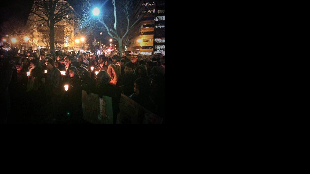 
A vigil in to honor the lives of three university students gunned down earlier this week was held in Dupont Circle in Washington D.C., February 12, 2015.
