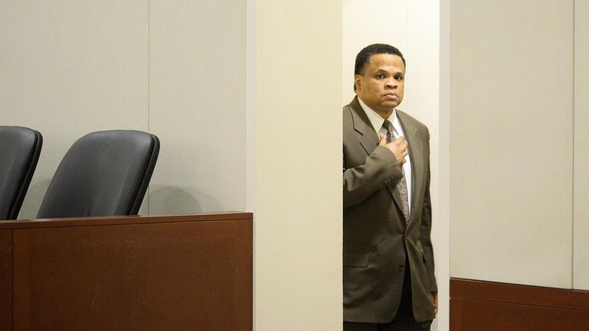 Tim Crumitie enters Courtroom 5370 in the Mecklenburg County, North Carolina, courthouse during his trial for murder on Monday. Crumitie is an ordained minister.