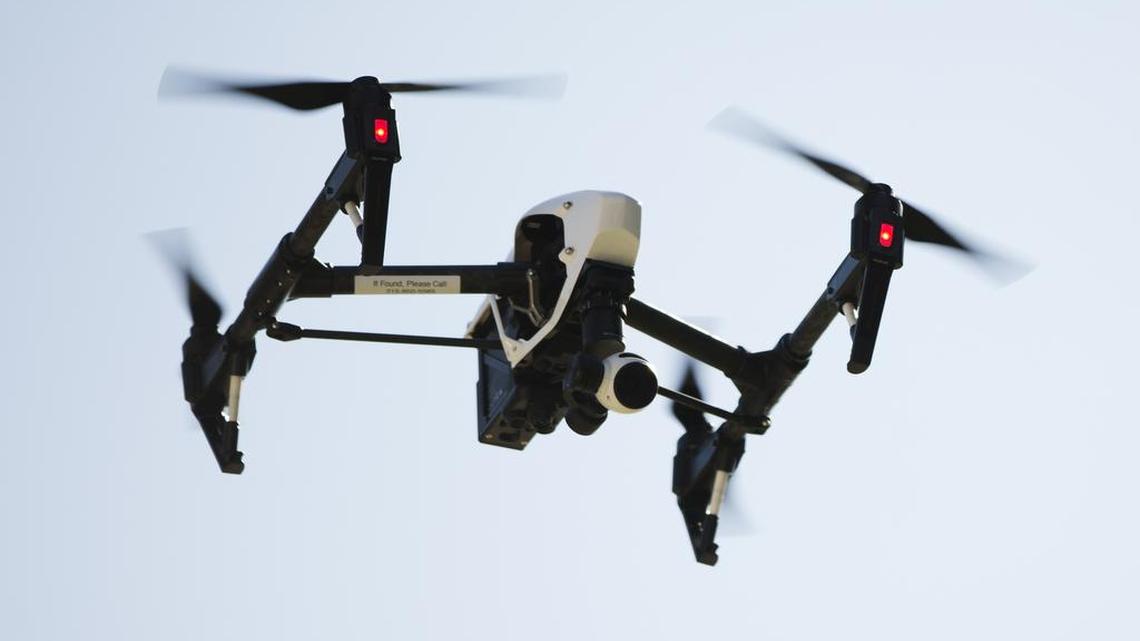A drone captures videos and still images of an apartment building in Philadelphia in April, a chore that no longer will require an Federal Aviation Administration waiver. Routine commercial use of small drones was approved Tuesday by the FAA after years of struggling to write new rules.
