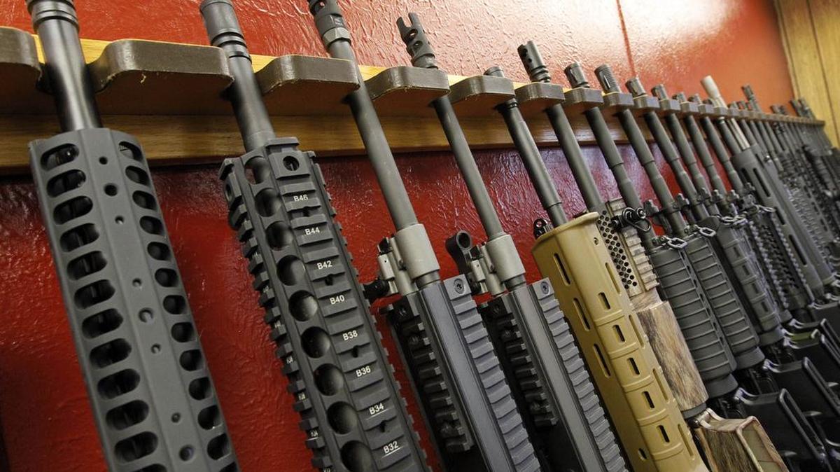 A row of powerful firearms is displayed for sale at the Firing-Line indoor range and gun shop in Aurora, Colo., in 2012. A new McClatchy-Marist poll finds that voters are more fearful of being victims of gun violence than an act of terrorism.