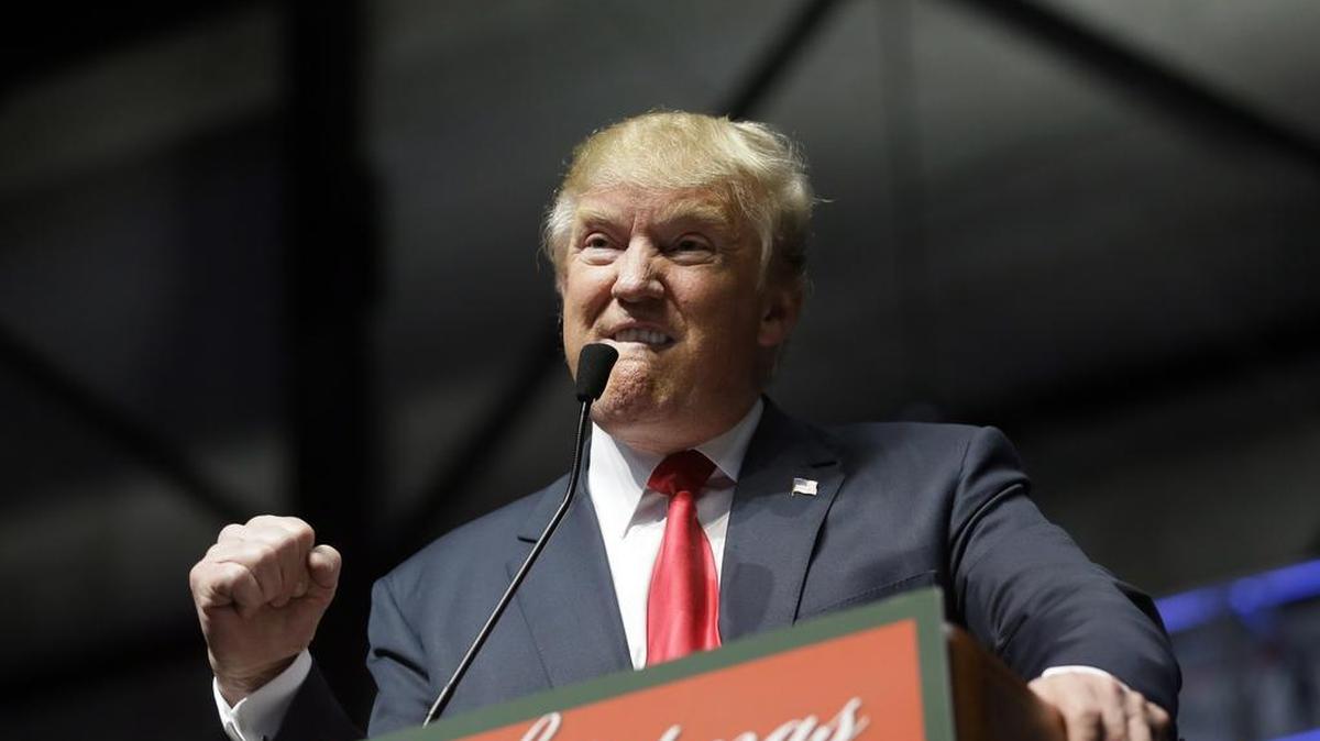 Republican presidential candidate, businessman Donald Trump addresses supporters at a campaign rally, Monday, Dec. 21, 2015, in Grand Rapids, Mich.