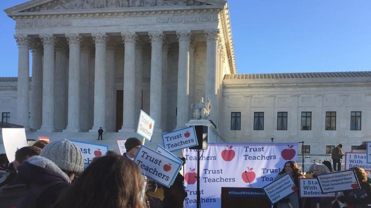Teachers demonstrate outside the Supreme Court on Monday.