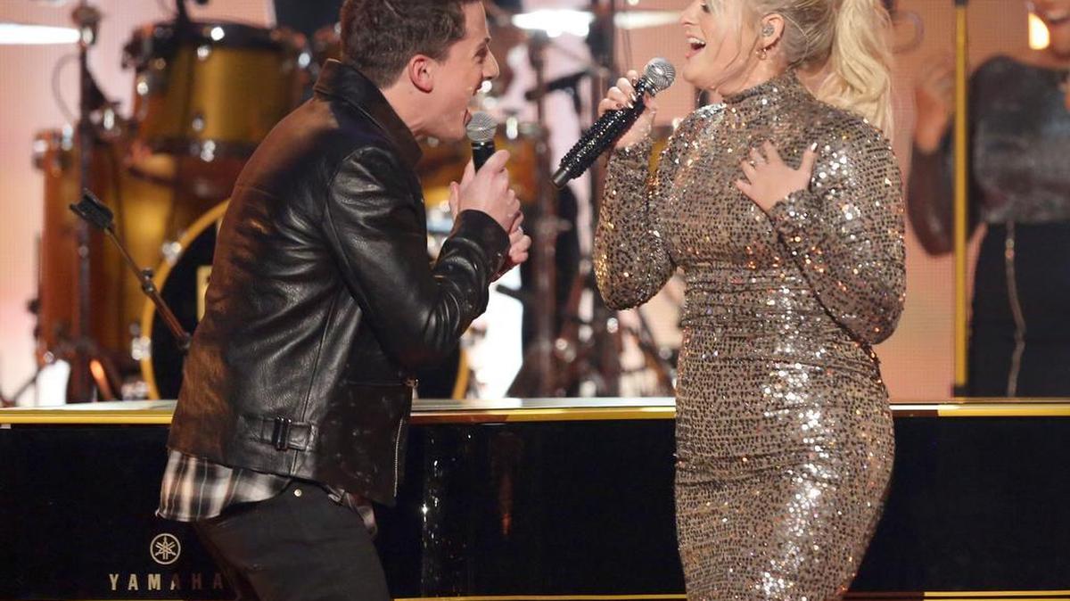 Charlie Puth, left, and Meghan Trainor perform at the American Music Awards at the Microsoft Theater on Sunday, Nov. 22, 2015, in Los Angeles.