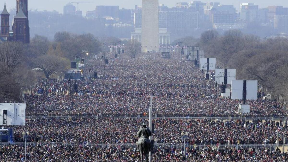President Barack Obama’s first inauguration drew a record 1.8 million people to the National Mall on Jan. 20, 2009. Planners say President-elect Donald Trump’s inauguration is expected to draw 800,000, based on past attendance and data including hotel and restaurant reservations and chartered buses.