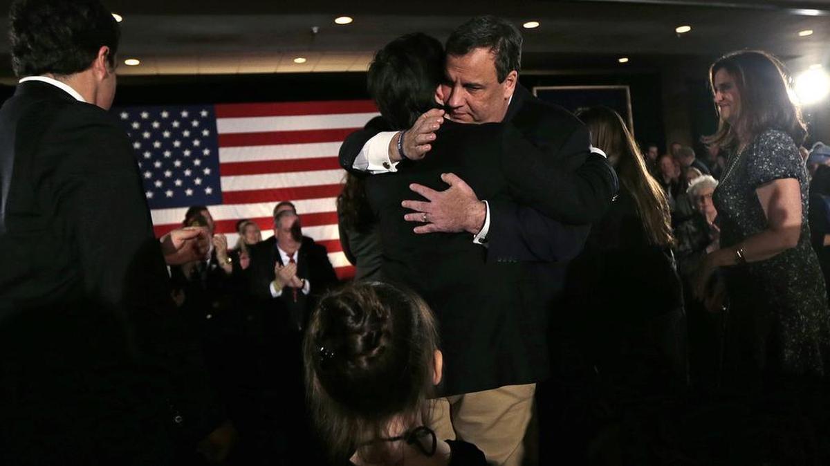Republican presidential candidate, New Jersey Gov. Chris Christie embraces his son Patrick during a primary night rally in Nashua, N.H., Tuesday, Feb. 9, 2016. At left is Christie's older son Andrew and wife Mary Pat at right.