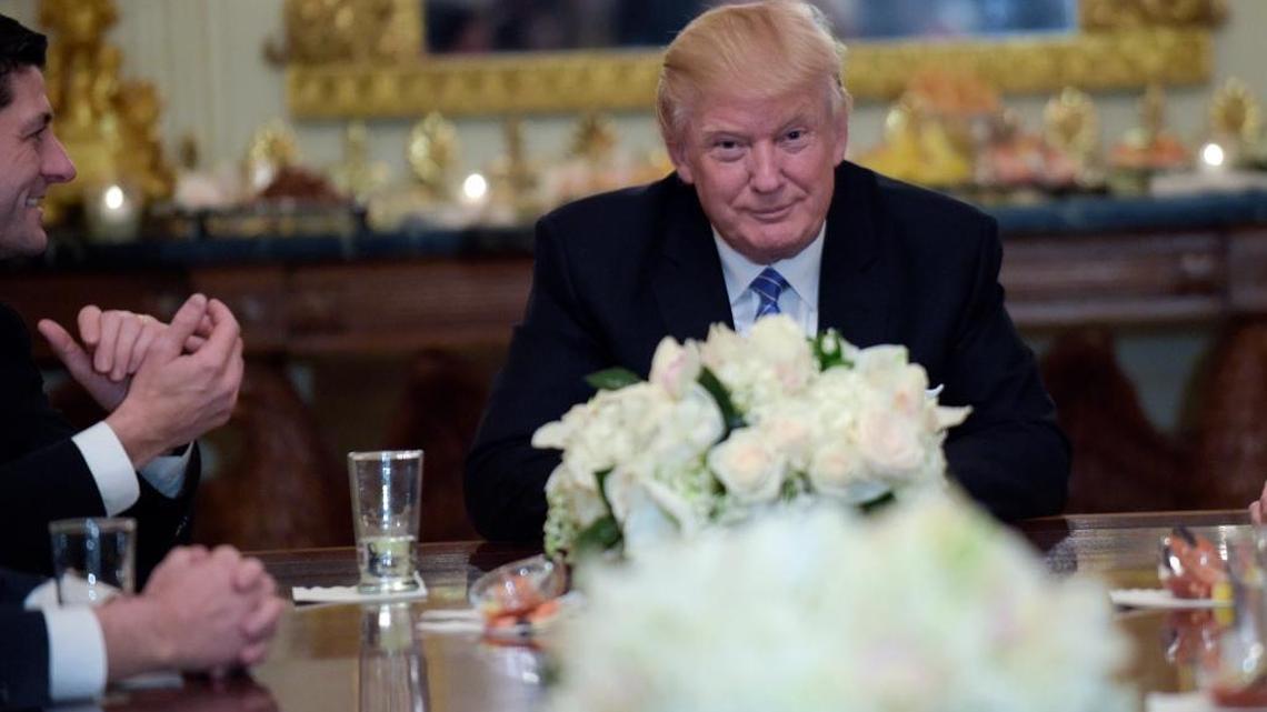 President Donald Trump hosts a reception for House and Senate leaders in the the State Dining Room of the White House on Monday.