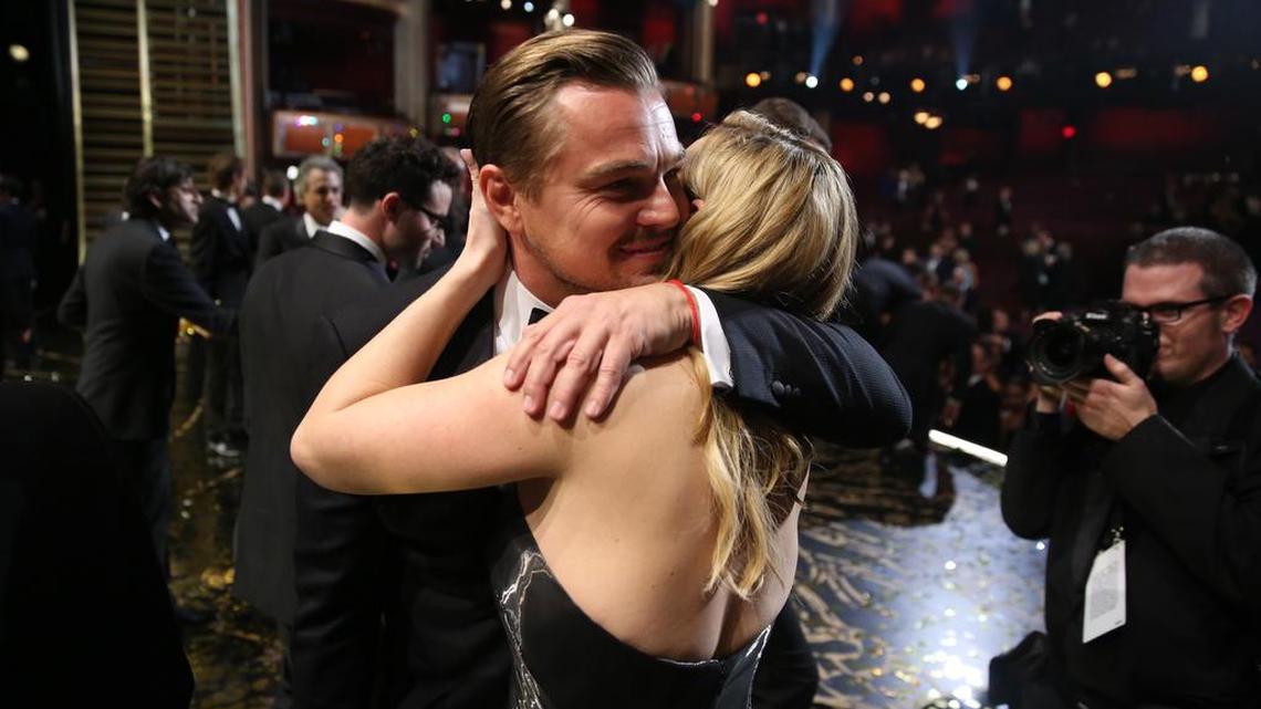 Leonardo DiCaprio, winner of the award for best actor in a leading role for "The Revenant," embraces pal and “Titanic” costar Kate Winslet backstage.