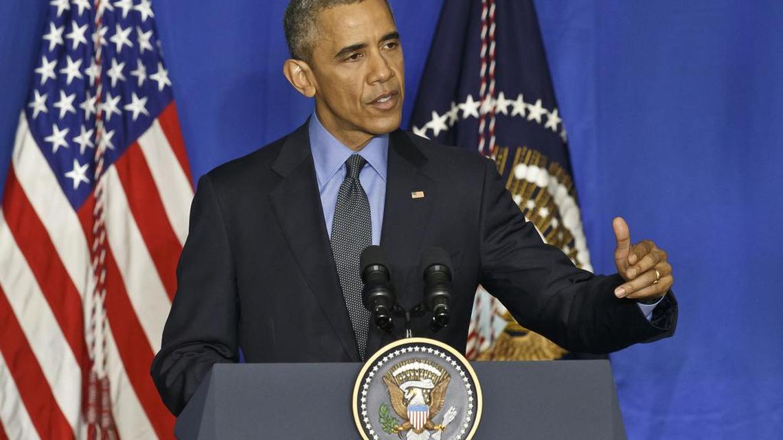 U.S. President Barack Obama discusses the Climate Change summit during a news conference at the Organization for Economic Cooperation and Development in Paris, Dec. 1, 2015.