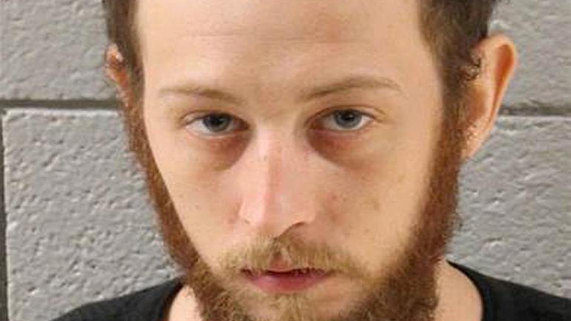 Joshua Lee Long was charged Thursday, July 14, 2016, with abuse of a corpse and conspiracy, accusing Long of spraying fluid used to embalm a human brain on marijuana before smoking it.