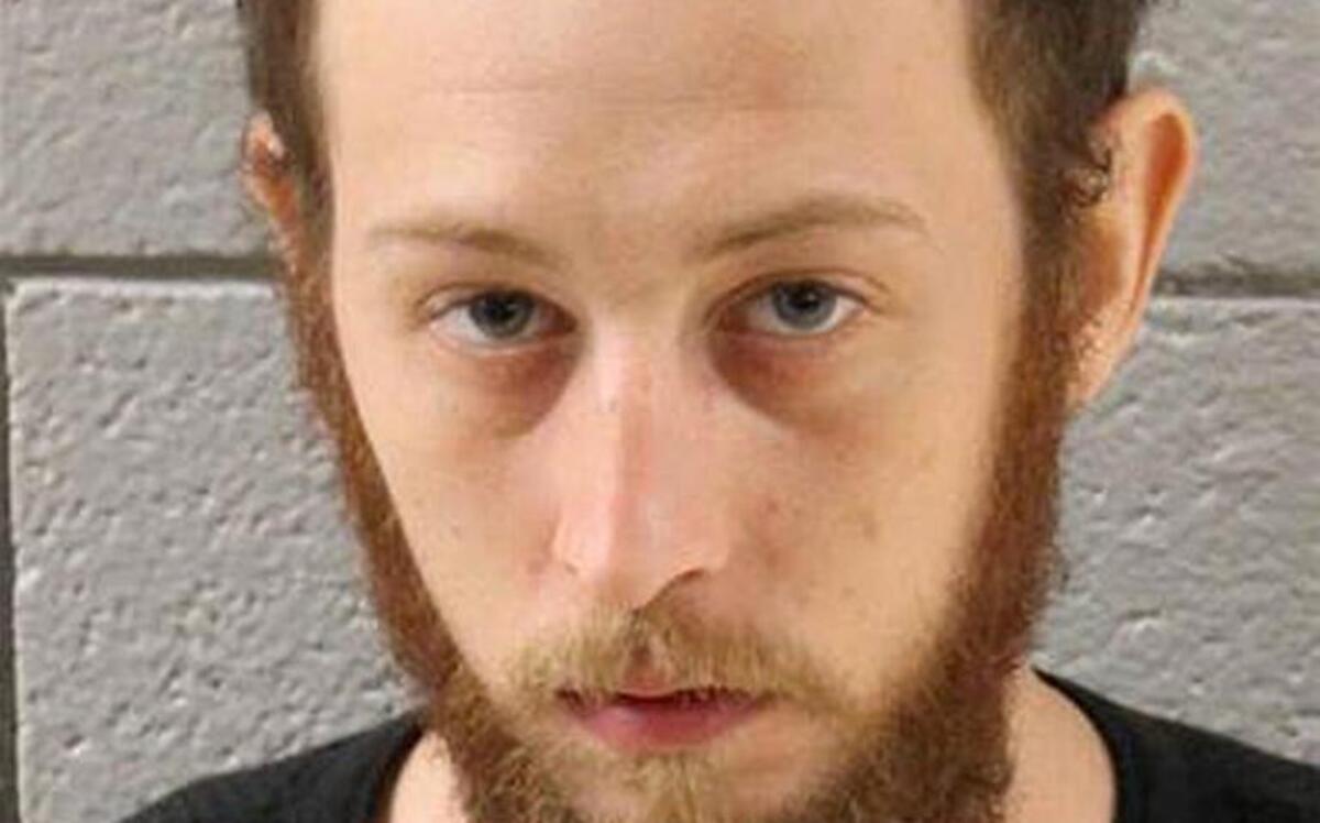 Joshua Lee Long was charged Thursday, July 14, 2016, with abuse of a corpse and conspiracy, accusing Long of spraying fluid used to embalm a human brain on marijuana before smoking it.