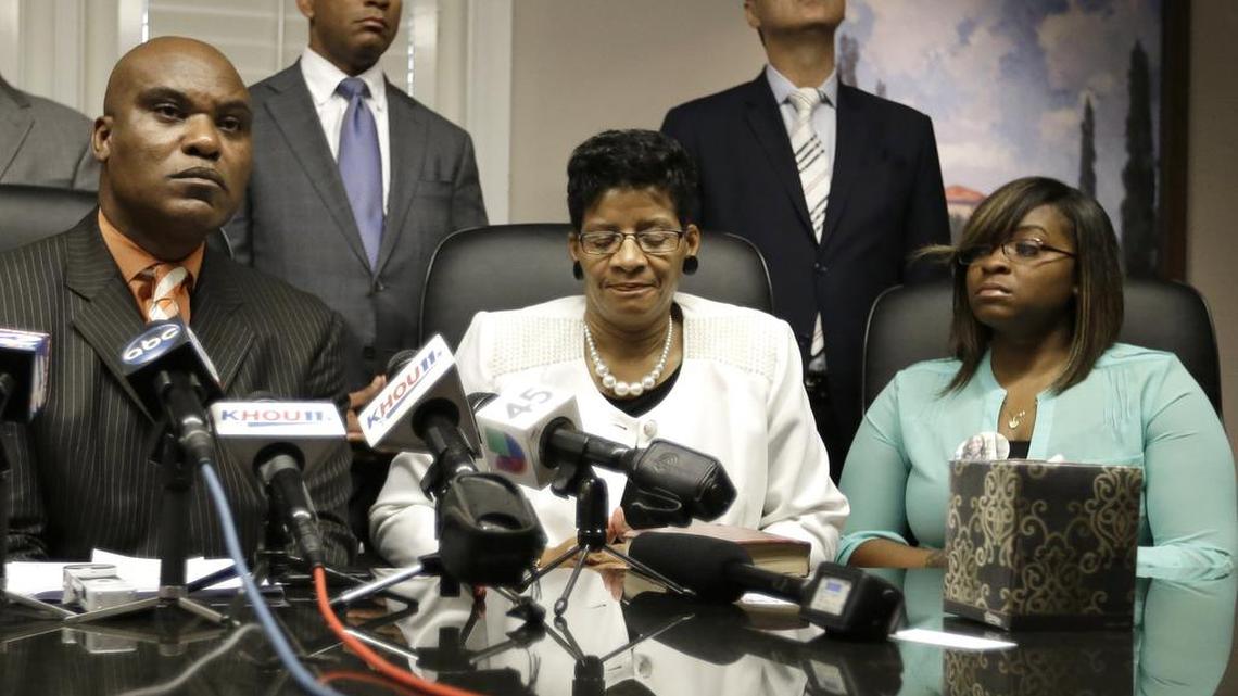 
Attorney Cannon Lambert, left, along with Sandra Bland's mother, Geneva Reed-Veal, center, and sister Sierra Cole hold a news conference, Tuesday in Houston. Bland was found dead in a Texas county jail three days after a confrontation with a white state trooper. The family filed a wrongful-death lawsuit against the officer and other officials, saying it was a last resort after being unable to get enough information about the case.
