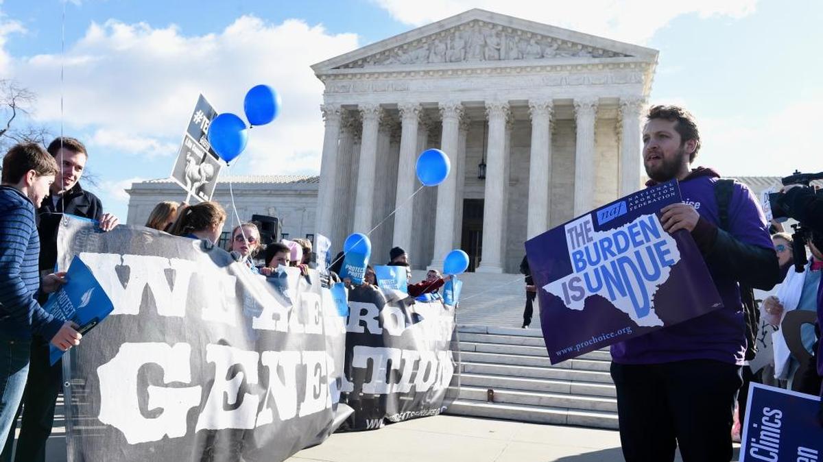 Pro-abortion-rights and anti-abortion protesters rallied outside the Supreme Court in Washington on Wednesday, March 2, 2016.