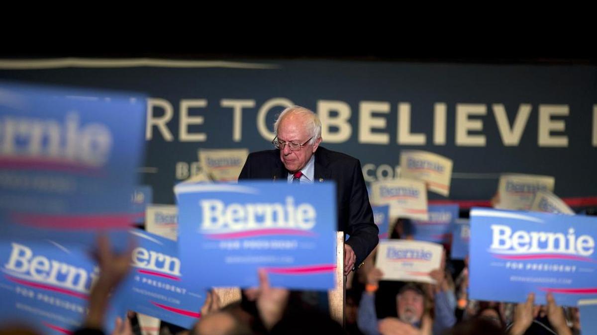 Democratic presidential candidate Sen. Bernie Sanders, I-Vt., looks downward as the crowd cheers for him at a rally Friday, Feb. 19, 2016, in Reno, Nev.