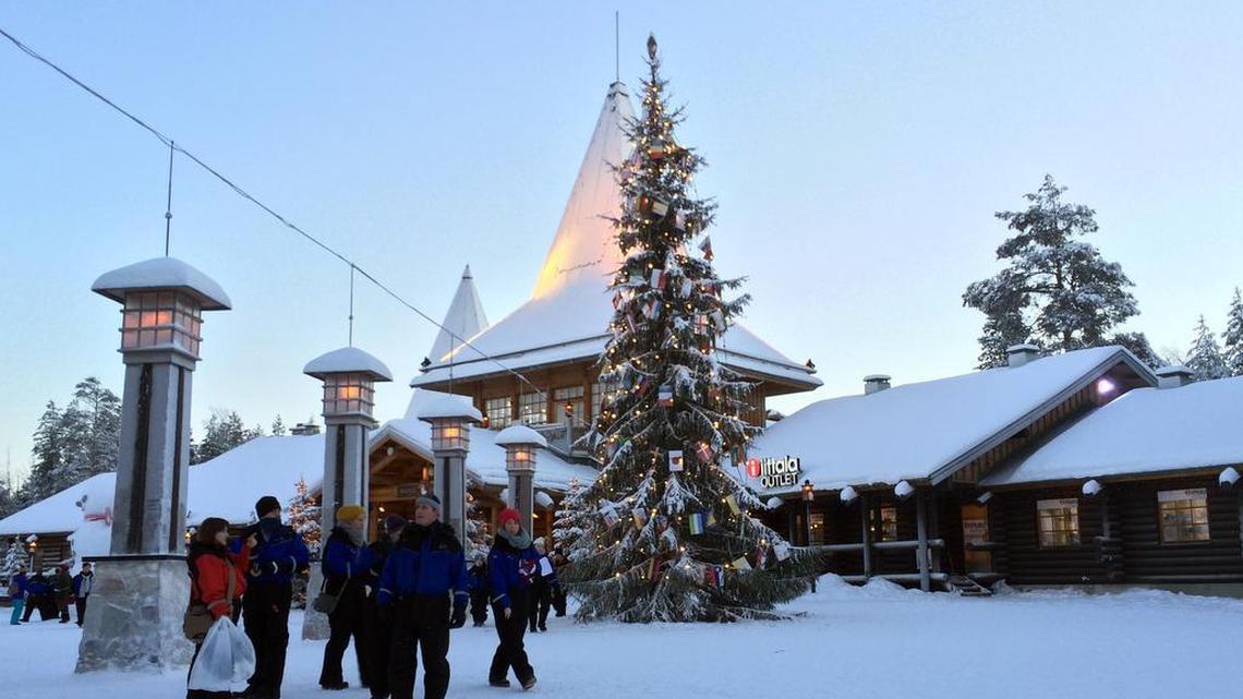 Visitors walk in Santa Claus Village in Finland, one of the Scandinavian countries where everyone’s tax returns are readily available to everyone else.