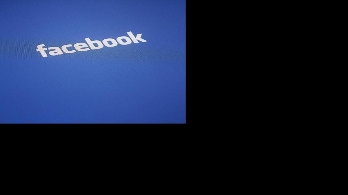 
This May 16, 2012, file photo shows a Facebook logo displayed on the screen of an iPad in New York. 
