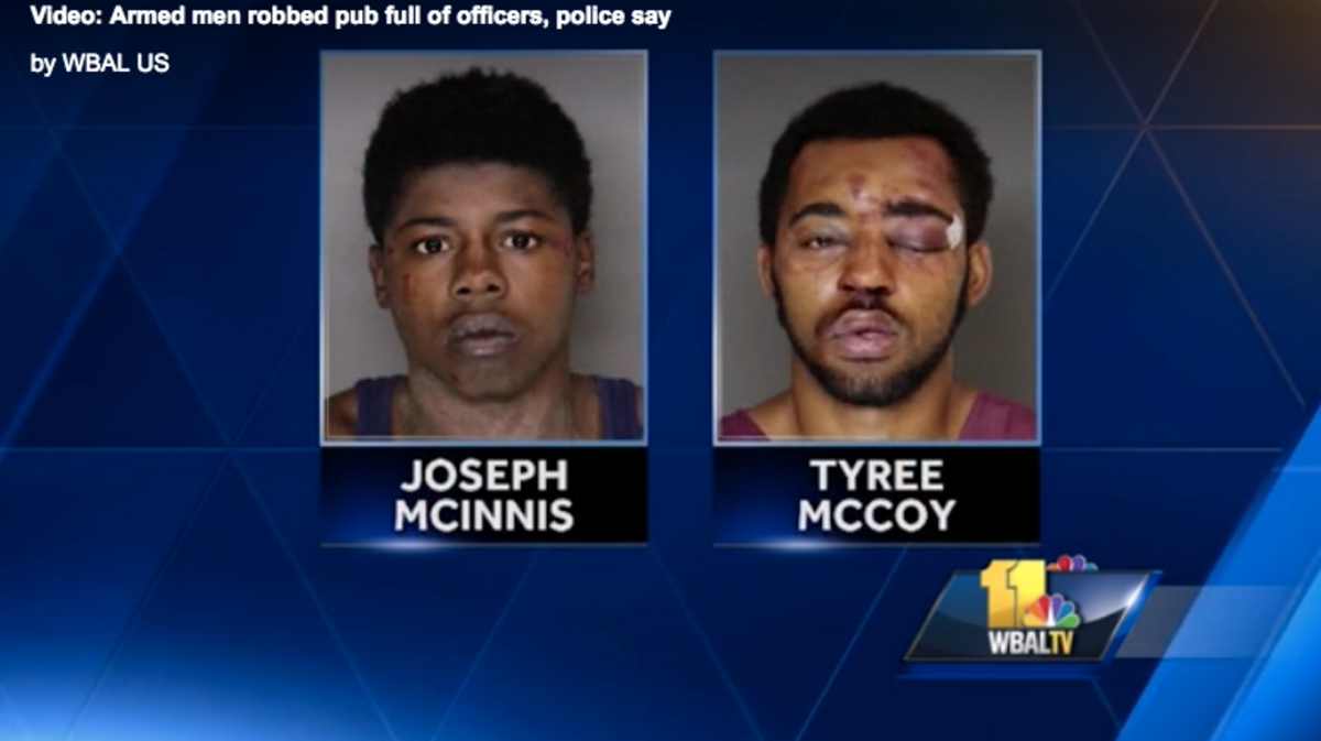 Two armed men showed up at a Maryland bar and demanded cash, police say. But off-duty police officers were celebrating at the same establishment, and quickly chased two suspects down.