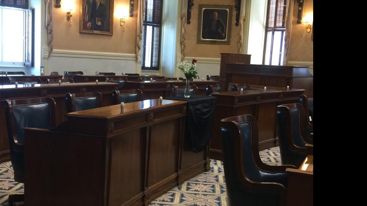 
A drape and a rose were placed on Sen. Pinckney’s desk at The Statehouse Thursday, June 18, 2015.
