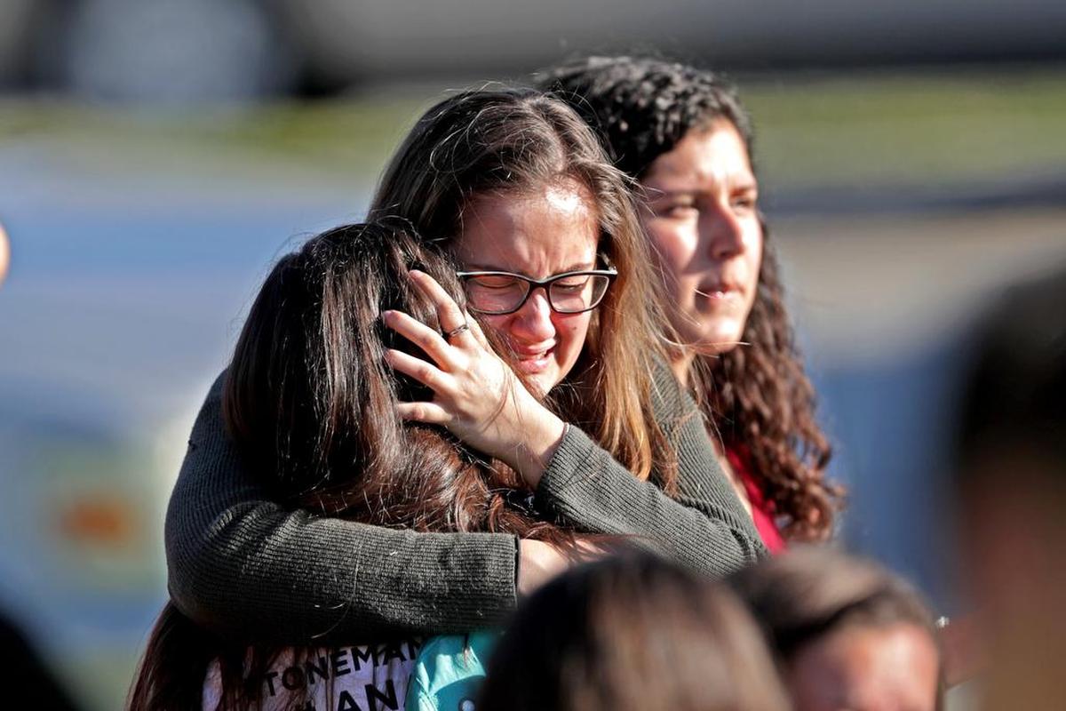 Students are released from a lockdown outside of Stoneman Douglas High School