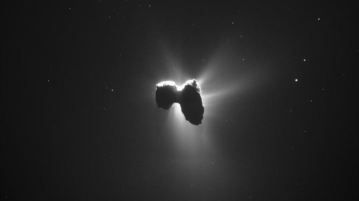 In this March 27, 2016 photo released by the European Space Agency ESA Comet 67P/Churyumov-Gerasimenko and its coma are backlit by the sun. The photo was taken by the NavCam of the Rosetta space probe from a distance of 329 km from the nucleus.