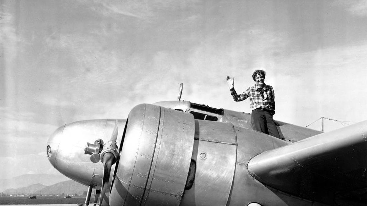 American aviatrix Amelia Earhart waves from the Electra before taking off from Los Angeles, Ca., on March 10, 1937. Earhart is flying to Oakland, Ca., where she and her crew will begin their round-the-world flight to Howland Island on March 18.