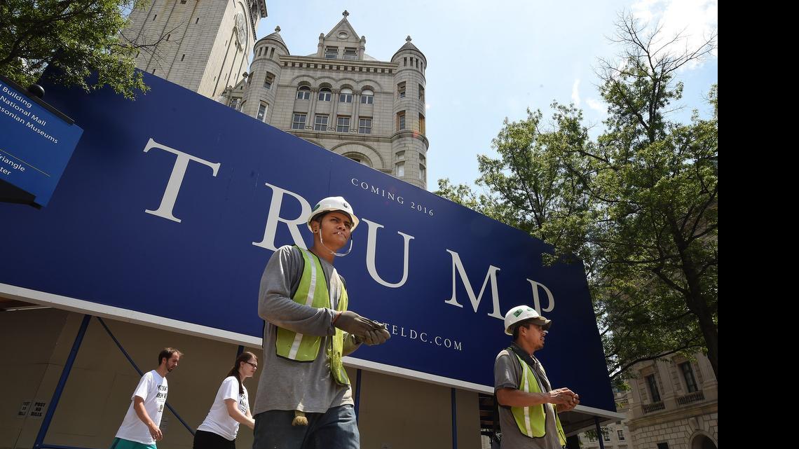 
Workers leave the site of the future Trump International Hotel, Washington, D.C. which is at the Old Post Office Pavilion on July 6. 
