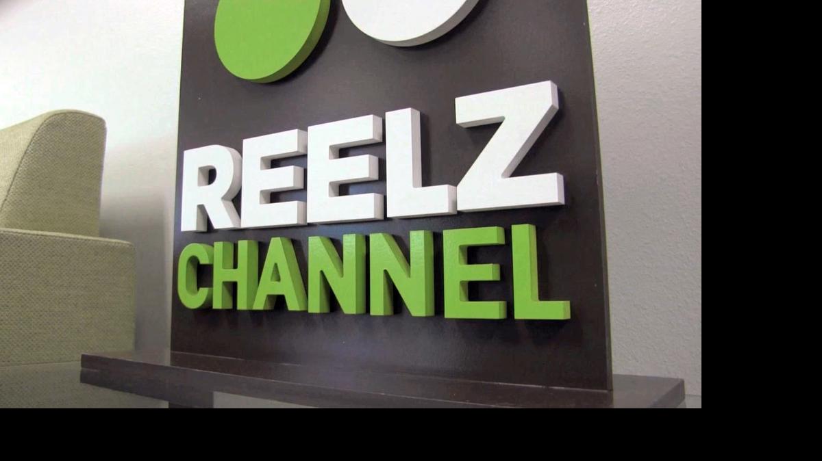 
This image taken from a video shows the entry of Reelz Channel in Albuquerque, N.M., July 2, 2015. Reelz CEO Stan E. Hubbard announced that the cable and satellite channel acquired the rights to Donald Trump's Miss USA pageant. 
