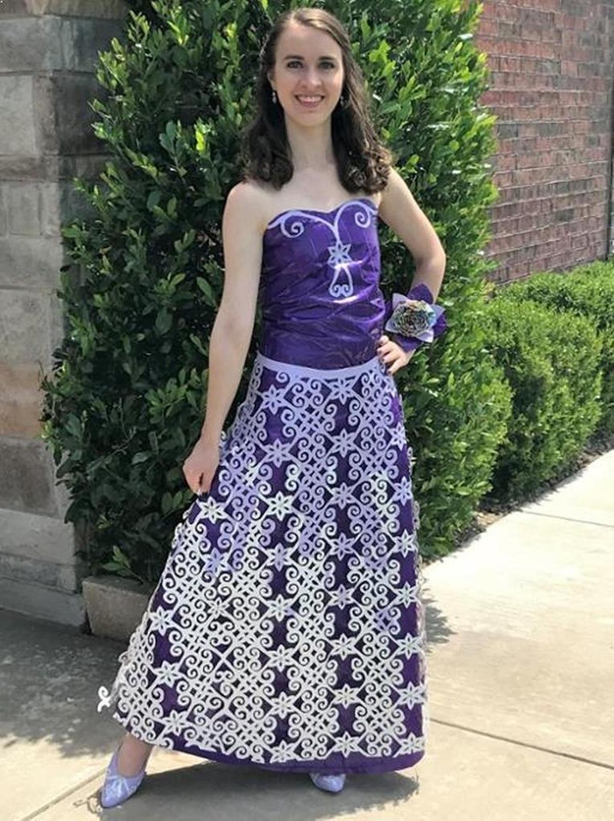 Allison Poolman of Elgin, Okla., won first prize in the single category after spending 79 hours making a purple strapless gown with snowflakes on the skirt out of 13 rolls of Duck Tape.