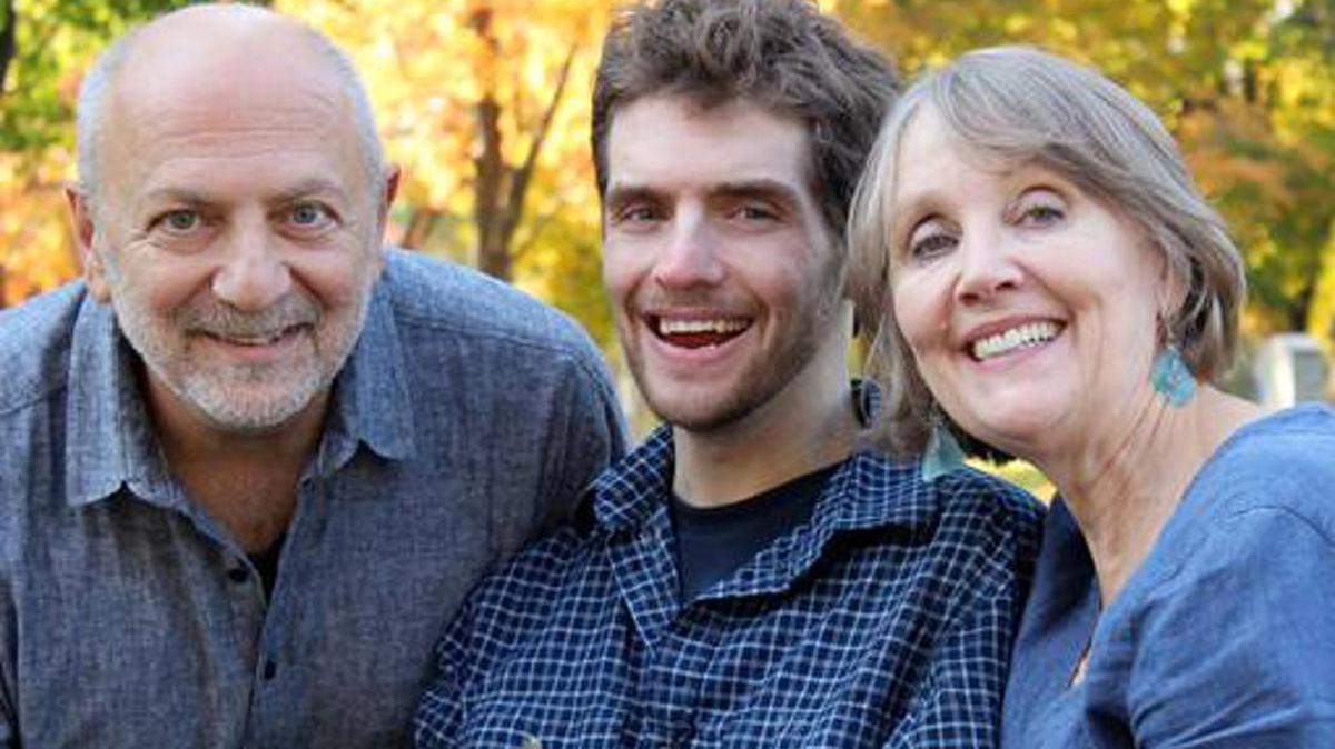 Renzo Viscardi, center, pictured with his parents, Anthony Viscardi and Cheryl Dougan, relies on round-the-clock care from home health aides.